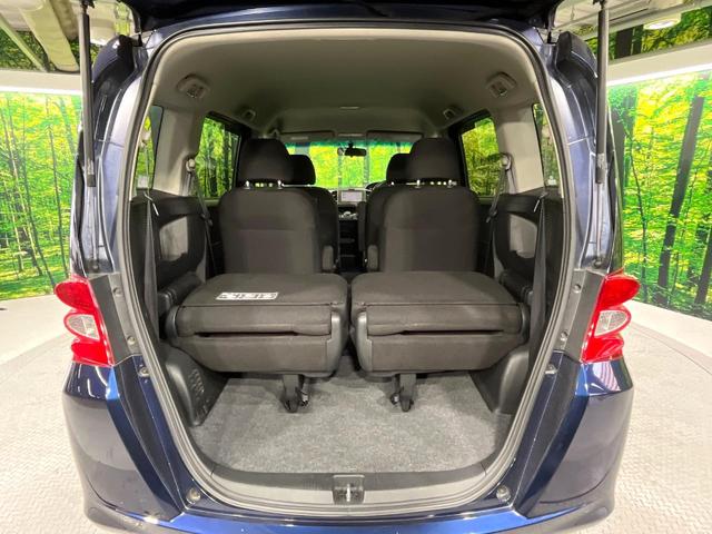 フリード Ｇ　ジャストセレクション　禁煙車　純正ナビ　バックカメラ　電動スライドドア　オートエアコン　ＥＴＣ　ＨＩＤライト　オートライト　キーレスエントリー　電動格納ミラー　ウィンカーミラー（10枚目）