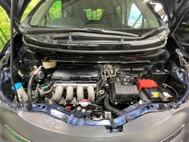 フリード Ｇ　ジャストセレクション　禁煙車　純正ナビ　バックカメラ　電動スライドドア　オートエアコン　ＥＴＣ　ＨＩＤライト　オートライト　キーレスエントリー　電動格納ミラー　ウィンカーミラー（18枚目）