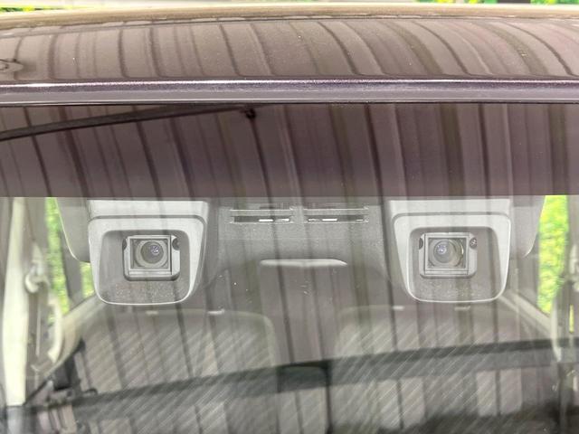 スペーシア Ｇリミテッド　禁煙車　デュアルカメラブレーキ　純正ナビ　電動スライド　シートヒーター　車線逸脱警報　スマートキー　プッシュスタート　ステアリングスイッチ　オートライト　オートエアコン（3枚目）