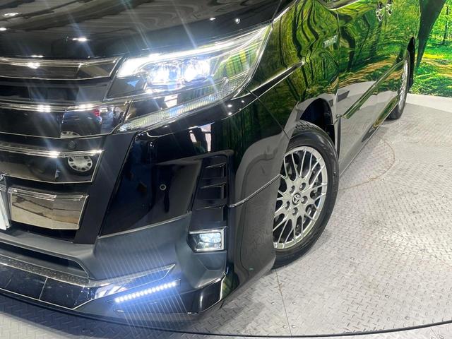 ノア ハイブリッドSi ダブルバイビーII TRDエアロ 禁煙車 セーフティセンス 純正9型ナビ 両側電動スライド シートヒーター クリアランスソナー クルコン LEDヘッド&フォグ オートハイビーム リアオートエアコン デュアルエアコン(13枚目)