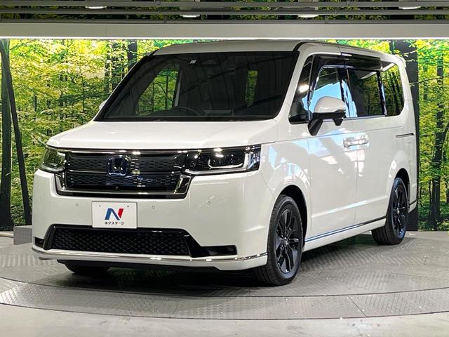 ステップワゴン ｅ：ＨＥＶスパーダ　全周囲カメラ　衝突被害軽減システム　レーダークルーズ　禁煙車　ハーフレザーシート　コーナーセンサー　スマートキー　ＬＥＤヘッド　ビルトインＥＴＣ　純正１６インチアルミ　オートハイビーム　車線逸脱警報（51枚目）