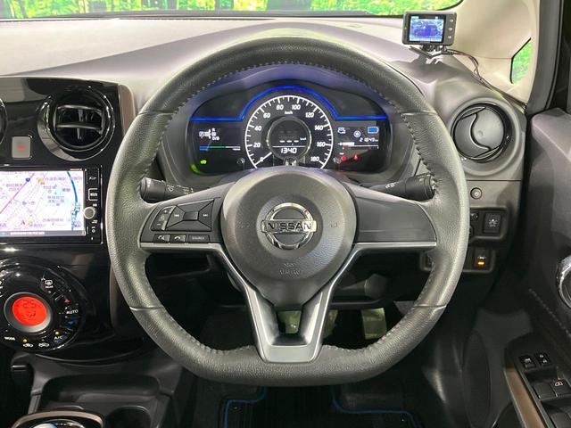 ノート ｅ－パワー　メダリスト　禁煙車　フルエアロ　全周囲カメラ　純正ＳＤナビ　衝突軽減　ドラレコ　デジタルミラー　コーナーセンサー　スマートキー　ＬＥＤヘッド　ＥＴＣ　純正１５インチアルミ　ハーフレザーシート　車線逸脱警報（27枚目）