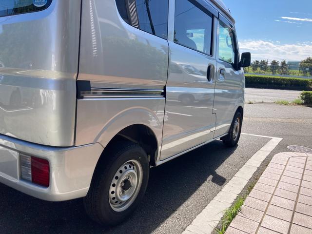 ＮＶ１００クリッパーバン ＤＸ　ＧＬパッケージ　冠水歴車エアコンパワステパワーウィンドキーレスエントリーフル装備４ＡＴプライバシーガラスセキュリティーアラームドアバイザーヘッドライトレベライザーハイルーフ５ドア２／４人乗り（18枚目）