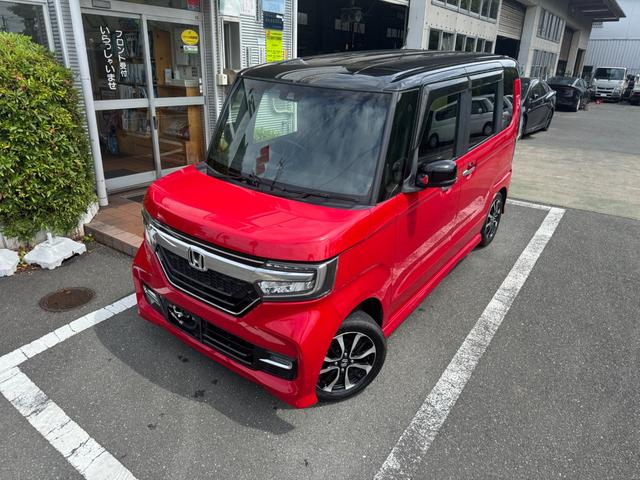 Ｎ－ＢＯＸカスタム Ｇ・Ｌホンダセンシング　雹害車ナビＴＶバックカメラＥＴＣ車載器付ＢＴ対応スマートキーＰスタートイモビ付ホンダセンシング衝突軽減ブレーキ付踏み間違え防止装置白線逸脱警報両側パワスラＬＥＤヘッド前席シートヒーター横滑り防止（2枚目）