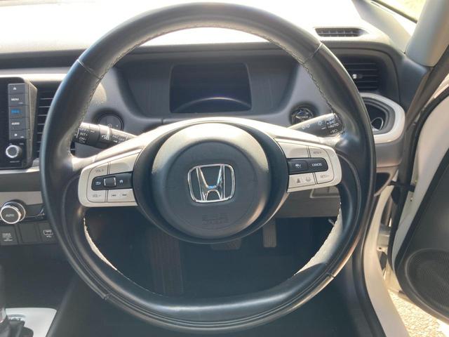 フィット ｅ：ＨＥＶホーム　冠水歴車ナビＴＶバックカメラＢＴオーディオ対応ＥＴＣ車載器付センシング衝突軽減ブレーキ踏み間違え防止禁煙車ハイブリッドスマートキーＰスタートイモビライザードライブレコーダーエアロリヤスポイラー付（64枚目）