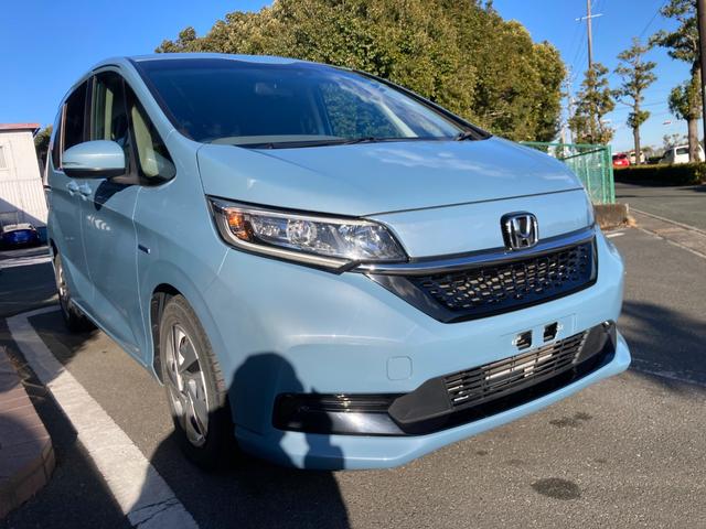 フリードハイブリッド ハイブリッド・Ｇホンダセンシング　冠水歴車ナビＴＶバックカメラＥＴＣＢＴ対応禁煙車センシング衝突軽減ブレーキ踏み間違え防止アダプティブクルコン両側パワスラスマートキーＣパッケージＬＥＤヘッドカーテンエアバッグオートリトラミラー（5枚目）