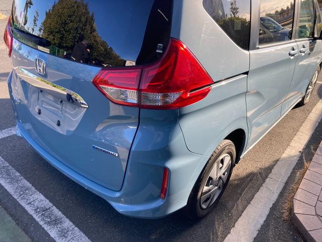 フリードハイブリッド ハイブリッド・Ｇホンダセンシング　冠水歴車ナビＴＶバックカメラＥＴＣＢＴ対応禁煙車センシング衝突軽減ブレーキ踏み間違え防止アダプティブクルコン両側パワスラスマートキーＣパッケージＬＥＤヘッドカーテンエアバッグオートリトラミラー（21枚目）