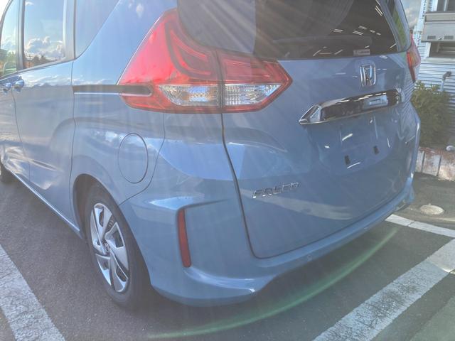 フリードハイブリッド ハイブリッド・Ｇホンダセンシング　冠水歴車ナビＴＶバックカメラＥＴＣＢＴ対応禁煙車センシング衝突軽減ブレーキ踏み間違え防止アダプティブクルコン両側パワスラスマートキーＣパッケージＬＥＤヘッドカーテンエアバッグオートリトラミラー（22枚目）