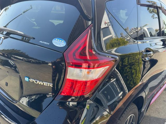 ノート ｅ－パワーニスモ　冠水歴車ナビＴＶバックカメラ全方位モニターＢＴオーディオ対応エマージェンシーブレーキ衝突軽減ブレーキ横滑り防止装置白線逸脱警報スマートキーＰスタートイモビライザー禁煙車プライバシーガラスリヤスポ（28枚目）
