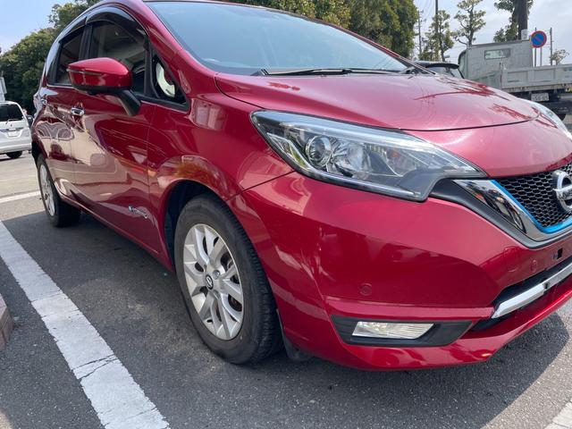 ノート ｅ－パワー　メダリスト　冠水歴車ナビＴＶアラウンドビューモニターエマージェンシーブレーキ禁煙車白線逸脱警報横滑り防止装置スマートキーＰスタートイモビライザー純正アルミ衝突安全ボディーステアリングスイッチ電格ミラー（18枚目）