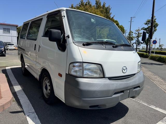 ボンゴバン ＤＸ　低床５ドアタイヤハウス有りエアコンパワステパワーウィンド保護棒付２名乗車リヤシートなし最大積載量７５０ｋｇ車両総重量２１９０ｋｇコラムオートマガソリン車ヘッドライトレベライザーリヤアンダーミラー（5枚目）