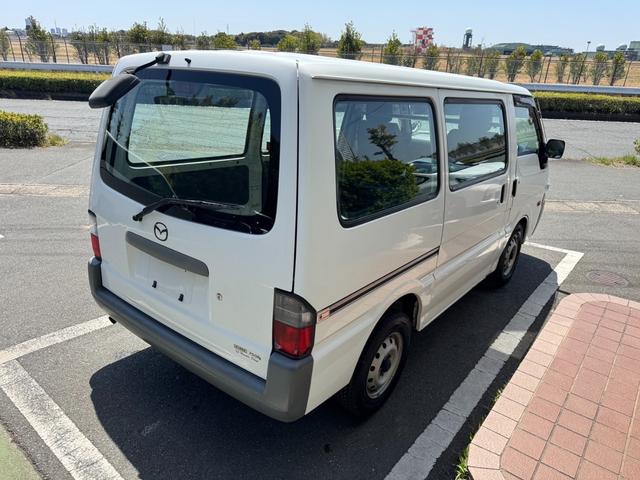 ボンゴバン ＤＸ　低床５ドアタイヤハウス有りエアコンパワステパワーウィンド保護棒付２名乗車リヤシートなし最大積載量７５０ｋｇ車両総重量２１９０ｋｇコラムオートマガソリン車ヘッドライトレベライザーリヤアンダーミラー（10枚目）