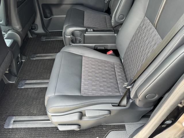 ノア ハイブリッドＳ－Ｚ　冠水歴車ナビＴＶバックカメラＥＴＣ２．０リヤフリップダウンモニター禁煙車ブラインドスポットモニターセーフティーセンスプリクラッシュセーフティースマートキーアダプティブクルコン両側パワスラハイブリッド車（73枚目）
