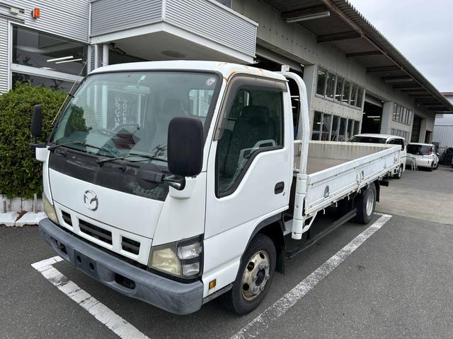 タイタントラック ワイドロングフルワイドロー　平ボディートラック２ｔ積載ワイドロング３方開きＥＴＣ車載器ロープ穴４対イージーゲート荷台鉄板張り荷台内寸長さ４３３ｃｍ幅２０２ｃｍ高さ３８ｃｍ床面地上高８７ｃｍ三方開き４８００ｃｃディーゼルターボ（2枚目）