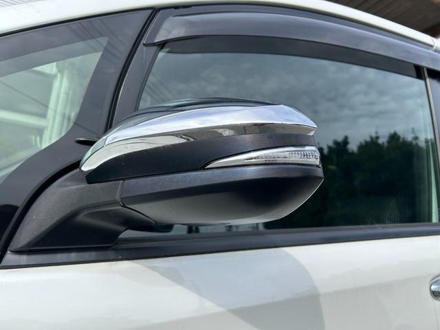 ヴォクシー ハイブリッドＺＳ　煌ＩＩ　冠水歴車バックカメラセーフティセンスプリクラッシュセーフティ禁煙車両側パワスラスマートキーＰスタートイモビ前席シートエアコンオートマチックハイビームトラクションコントロールクルーズコントロールパール白（28枚目）