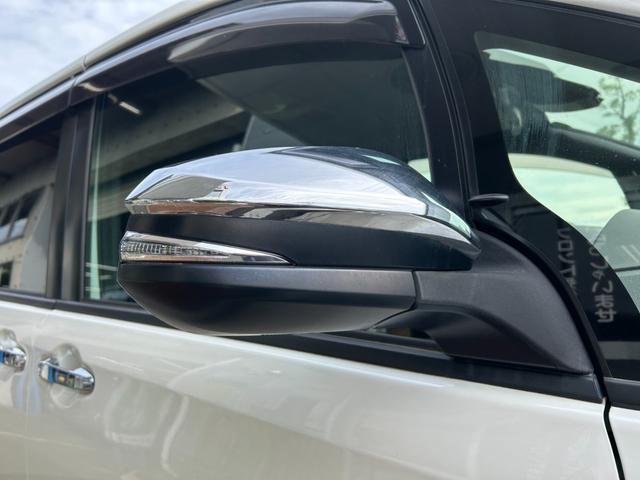 ヴォクシー ハイブリッドＺＳ　煌ＩＩ　冠水歴車バックカメラセーフティセンスプリクラッシュセーフティ禁煙車両側パワスラスマートキーＰスタートイモビ前席シートエアコンオートマチックハイビームトラクションコントロールクルーズコントロールパール白（30枚目）