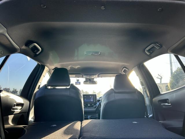 カローラスポーツ ハイブリッドＧ　スタイルパッケージ　冠水歴車ナビバックカメラＥＴＣ車載器セーフティセンスプリクラッシュセーフティーレーダークルコン禁煙車ＣＤＤＶＤ再生ブラインドスポットモニターメンテノート取説ドラレコ前後前席シートヒーターハイブリッド車（63枚目）