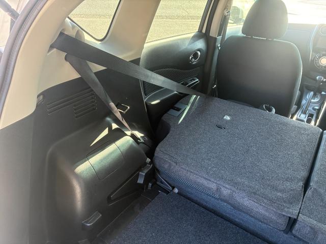 ノート Ｘ　ＤＩＧ－Ｓ　エマージェンシーブレーキパッケージ　ナビＴＶバックカメラアラウンドビューモニターＥＴＣ車載器禁煙車エマージェンシーブレーキ自動防眩式ルームミラーヒーター付ドアミラーホワイトパールスマートキーＰスタートイモビ衝突安全ボディースペアタイヤ付（64枚目）