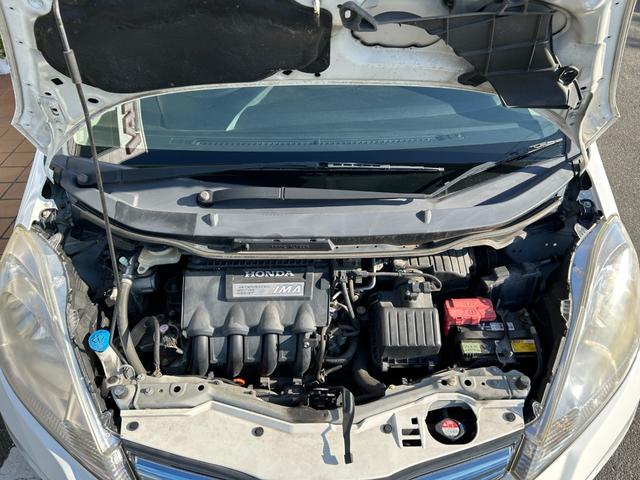 フィットハイブリッド ベースグレード 禁煙車ワンオーナーメンテナンスノート取説スペアキー付ハイブリッド車ナビTVドライブレコーダーETC車載器付ACPSPWキーレスエントリーフル装備衝突安全ボディークルーズコントロール(35枚目)