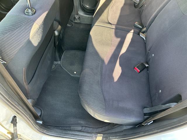 フィットハイブリッド ベースグレード 禁煙車ワンオーナーメンテナンスノート取説スペアキー付ハイブリッド車ナビTVドライブレコーダーETC車載器付ACPSPWキーレスエントリーフル装備衝突安全ボディークルーズコントロール(50枚目)