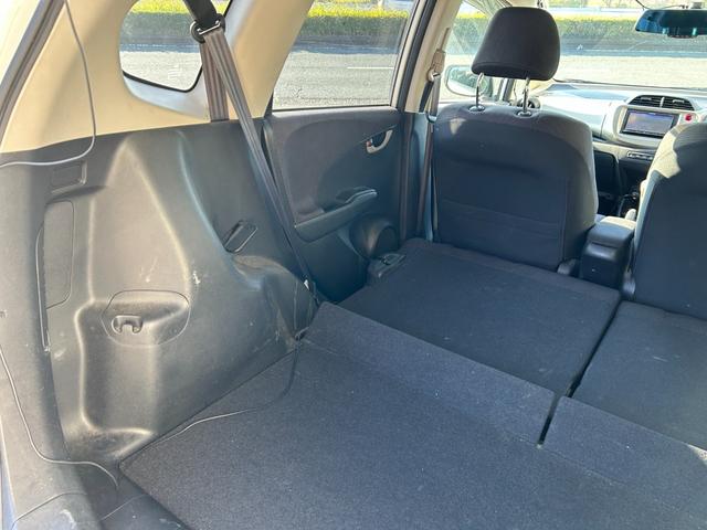 フィットハイブリッド ベースグレード 禁煙車ワンオーナーメンテナンスノート取説スペアキー付ハイブリッド車ナビTVドライブレコーダーETC車載器付ACPSPWキーレスエントリーフル装備衝突安全ボディークルーズコントロール(61枚目)