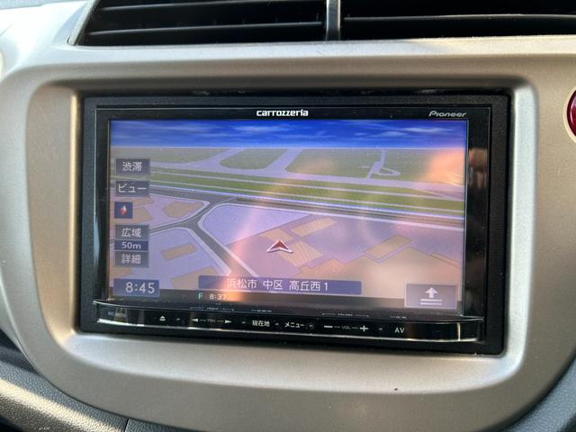 フィットハイブリッド ベースグレード 禁煙車ワンオーナーメンテナンスノート取説スペアキー付ハイブリッド車ナビTVドライブレコーダーETC車載器付ACPSPWキーレスエントリーフル装備衝突安全ボディークルーズコントロール(75枚目)