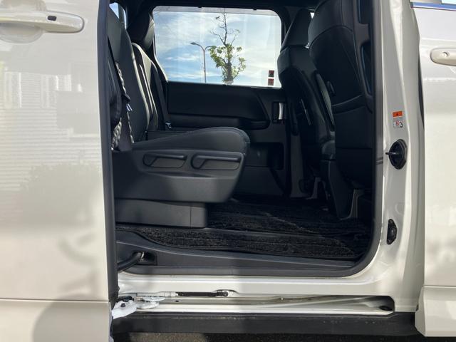 ヴォクシー ハイブリッドＳ－Ｚ　冠水歴車ナビＴＶバックカメラ全方位モニターリヤフリップダウンモニタセーフティーセンスプリクラッシュセーフティーレーダークルコンスマートキー２本Ｐスタートイモビ禁煙車ＥＴＣ２．０両側パワスラＬＥＤヘッド（56枚目）