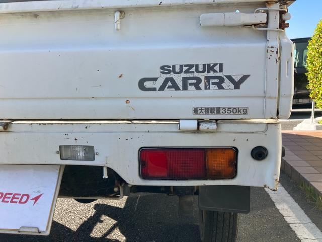 キャリイトラック ＫＵ　４ＷＤ５ＭＴ３方開きエアコンパワステ付ＡＭＦＭラジオ禁煙車ガソリン車ゲートアッパープレート荷台ゴムマットメンテナンスノート取説付き荷台内寸長１９２ｃｍ幅１３８ｃｍ高さ２８ｃｍ（20枚目）