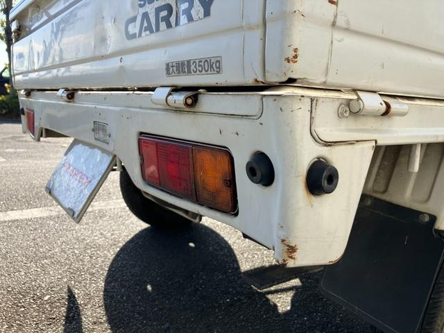 キャリイトラック ＫＵ　４ＷＤ５ＭＴ３方開きエアコンパワステ付ＡＭＦＭラジオ禁煙車ガソリン車ゲートアッパープレート荷台ゴムマットメンテナンスノート取説付き荷台内寸長１９２ｃｍ幅１３８ｃｍ高さ２８ｃｍ（21枚目）