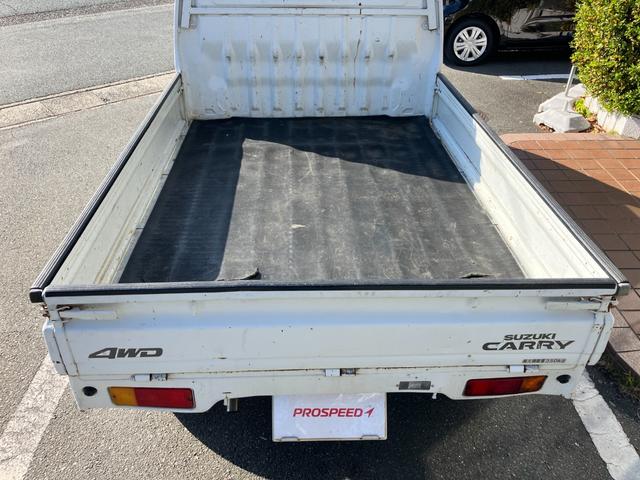 キャリイトラック ＫＵ　４ＷＤ５ＭＴ３方開きエアコンパワステ付ＡＭＦＭラジオ禁煙車ガソリン車ゲートアッパープレート荷台ゴムマットメンテナンスノート取説付き荷台内寸長１９２ｃｍ幅１３８ｃｍ高さ２８ｃｍ（51枚目）
