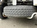ＫＣ　エアコンパワステ付２ＷＤ５ＭＴ三方開きメンテナンスノート取説付荷台幌車荷台内寸長さ１９７ＣＭ幅１３８ＣＭ床面地上高６８ＣＭヘッドライトレベライザースペアキースペアタイヤ運転席エアバッグ付（24枚目）