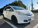 フィットハイブリッド ベースグレード 禁煙車ワンオーナーメンテナンスノート取説スペアキー付ハイブリッド車ナビTVドライブレコーダーETC車載器付ACPSPWキーレスエントリーフル装備衝突安全ボディークルーズコントロール(5枚目)