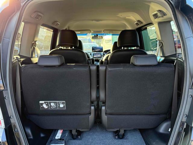 フリードハイブリッド ジャストセレクション　ドライブレコーダー　ナビ　オートクルーズコントロール　両側電動スライドドア　オートライト　ＨＩＤ　スマートキー　電動格納ミラー　３列シート　ウォークスルー　ＣＶＴ　アルミホイール　Ｂｌｕｅｔｏｏｔｈ（19枚目）