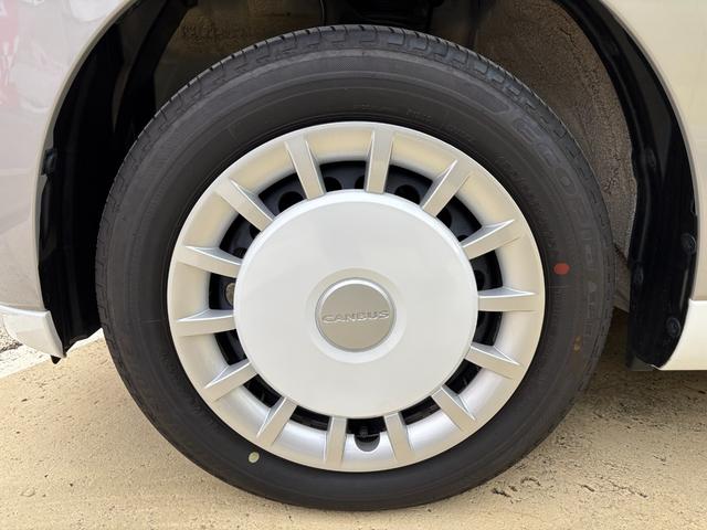 ムーヴキャンバス ストライプスG 14インチフルホイールキャップ LEDヘッドランプ LEDフォグランプ ホっとカップホルダー 両側パワースライドドア キーフリーシステム プッシュボタンスタート UVカットガラス(9枚目)