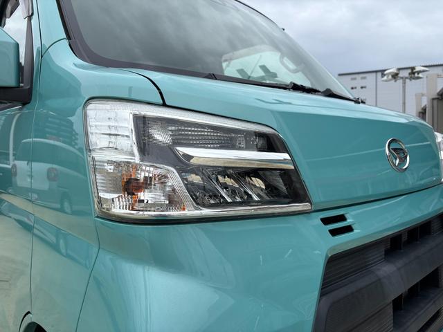 ハイゼットカーゴ クルーズSAIII 2WD MT 電動格納式カラードドアミラー UVカットガラス(フロントウィンドウ) 12インチフルホイールキャップ 撥水フルファヴリックシート表皮 キーレスエントリー マニュアルエアコン(9枚目)