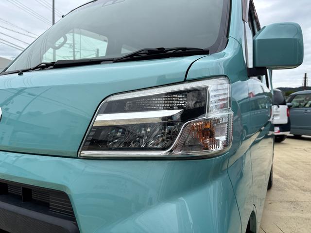 ハイゼットカーゴ クルーズSAIII 2WD MT 電動格納式カラードドアミラー UVカットガラス(フロントウィンドウ) 12インチフルホイールキャップ 撥水フルファヴリックシート表皮 キーレスエントリー マニュアルエアコン(10枚目)