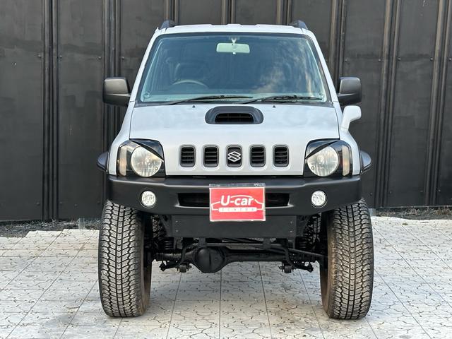 ジムニー XC 【1年間走行無制限保証】/フルカスタム車両(エアロ・マフラー・スキッドプレート・リフトアップ・ブリスターフェンダー・LEDテール・シートカバー・アルミホイール)/Bluetoothオーディオ付社外ナビ(10枚目)