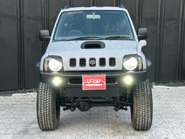 ジムニー XC 【1年間走行無制限保証】/フルカスタム車両(エアロ・マフラー・スキッドプレート・リフトアップ・ブリスターフェンダー・LEDテール・シートカバー・アルミホイール)/Bluetoothオーディオ付社外ナビ(11枚目)