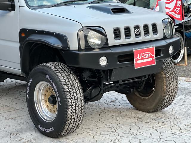 ジムニー XC 【1年間走行無制限保証】/フルカスタム車両(エアロ・マフラー・スキッドプレート・リフトアップ・ブリスターフェンダー・LEDテール・シートカバー・アルミホイール)/Bluetoothオーディオ付社外ナビ(16枚目)