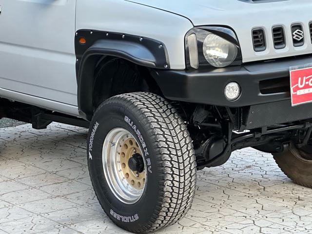 ジムニー XC 【1年間走行無制限保証】/フルカスタム車両(エアロ・マフラー・スキッドプレート・リフトアップ・ブリスターフェンダー・LEDテール・シートカバー・アルミホイール)/Bluetoothオーディオ付社外ナビ(18枚目)