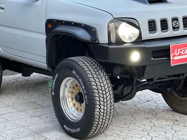 ジムニー XC 【1年間走行無制限保証】/フルカスタム車両(エアロ・マフラー・スキッドプレート・リフトアップ・ブリスターフェンダー・LEDテール・シートカバー・アルミホイール)/Bluetoothオーディオ付社外ナビ(19枚目)