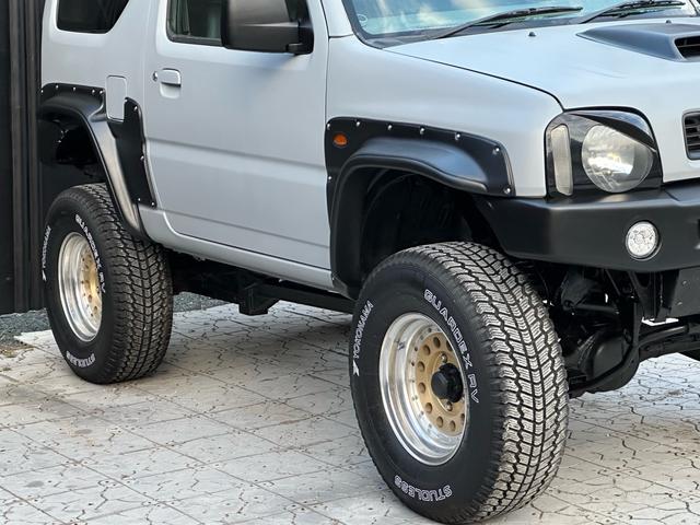 ジムニー XC 【1年間走行無制限保証】/フルカスタム車両(エアロ・マフラー・スキッドプレート・リフトアップ・ブリスターフェンダー・LEDテール・シートカバー・アルミホイール)/Bluetoothオーディオ付社外ナビ(20枚目)