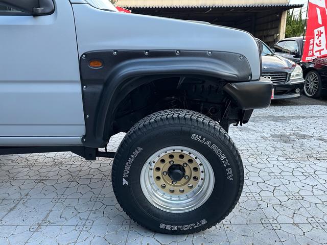 ジムニー XC 【1年間走行無制限保証】/フルカスタム車両(エアロ・マフラー・スキッドプレート・リフトアップ・ブリスターフェンダー・LEDテール・シートカバー・アルミホイール)/Bluetoothオーディオ付社外ナビ(22枚目)