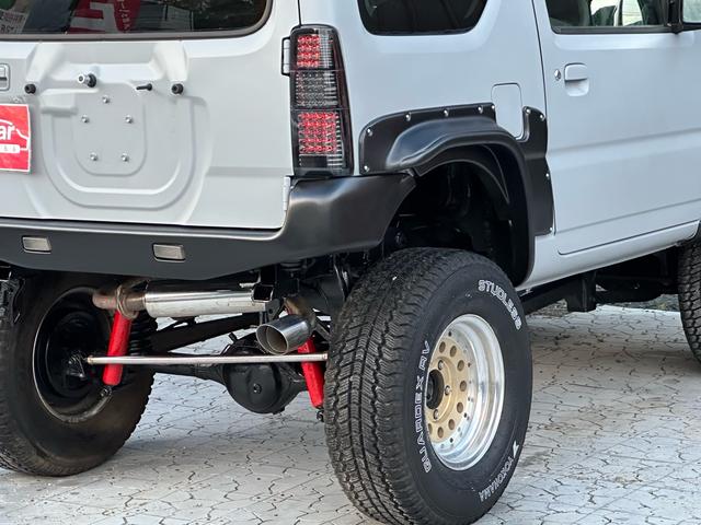 ジムニー XC 【1年間走行無制限保証】/フルカスタム車両(エアロ・マフラー・スキッドプレート・リフトアップ・ブリスターフェンダー・LEDテール・シートカバー・アルミホイール)/Bluetoothオーディオ付社外ナビ(29枚目)