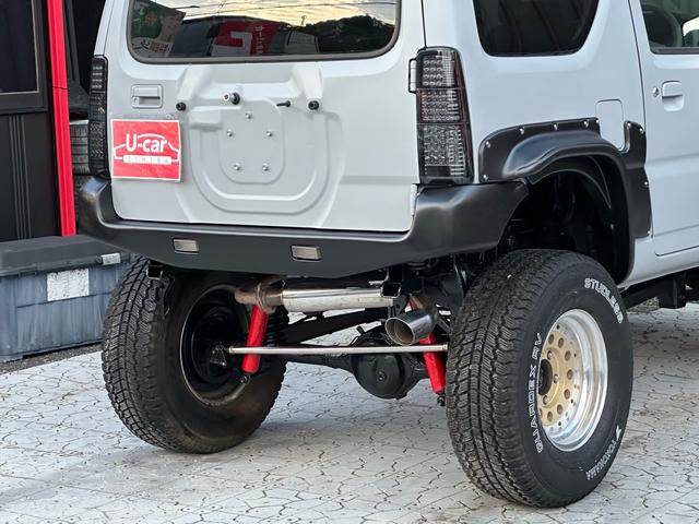 ジムニー XC 【1年間走行無制限保証】/フルカスタム車両(エアロ・マフラー・スキッドプレート・リフトアップ・ブリスターフェンダー・LEDテール・シートカバー・アルミホイール)/Bluetoothオーディオ付社外ナビ(30枚目)