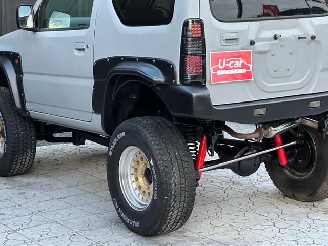 ジムニー XC 【1年間走行無制限保証】/フルカスタム車両(エアロ・マフラー・スキッドプレート・リフトアップ・ブリスターフェンダー・LEDテール・シートカバー・アルミホイール)/Bluetoothオーディオ付社外ナビ(45枚目)