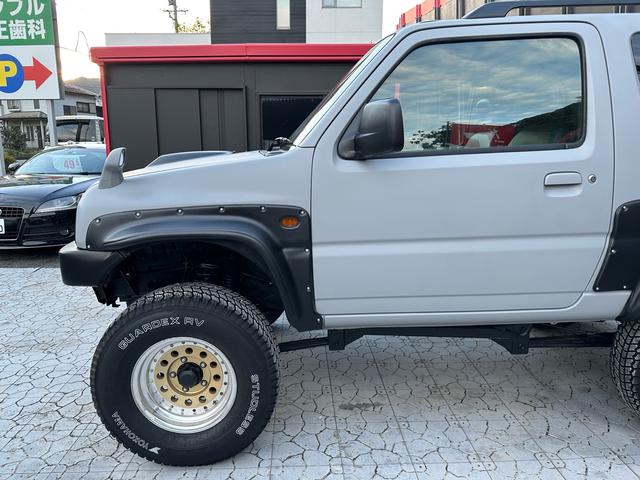 ジムニー XC 【1年間走行無制限保証】/フルカスタム車両(エアロ・マフラー・スキッドプレート・リフトアップ・ブリスターフェンダー・LEDテール・シートカバー・アルミホイール)/Bluetoothオーディオ付社外ナビ(49枚目)