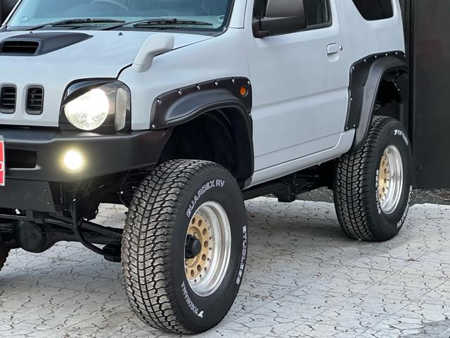 ジムニー XC 【1年間走行無制限保証】/フルカスタム車両(エアロ・マフラー・スキッドプレート・リフトアップ・ブリスターフェンダー・LEDテール・シートカバー・アルミホイール)/Bluetoothオーディオ付社外ナビ(52枚目)