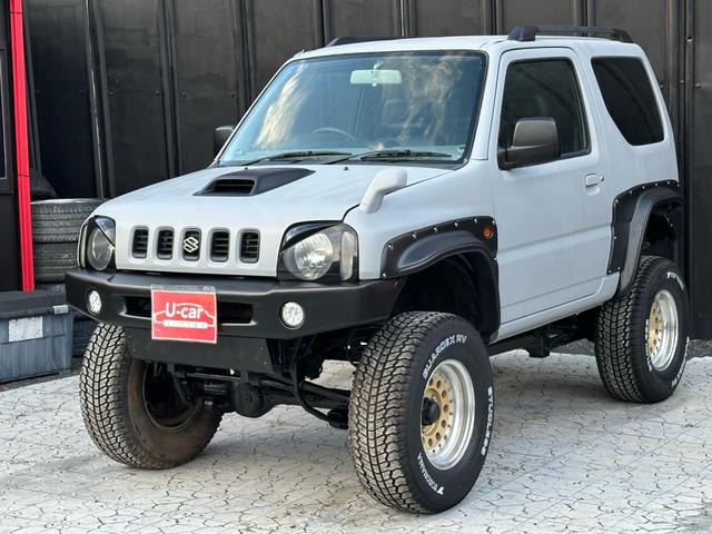 ジムニー XC 【1年間走行無制限保証】/フルカスタム車両(エアロ・マフラー・スキッドプレート・リフトアップ・ブリスターフェンダー・LEDテール・シートカバー・アルミホイール)/Bluetoothオーディオ付社外ナビ(57枚目)