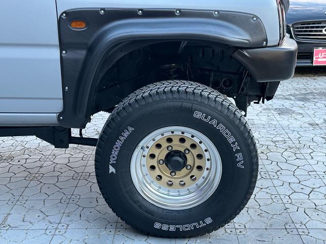 ジムニー XC 【1年間走行無制限保証】/フルカスタム車両(エアロ・マフラー・スキッドプレート・リフトアップ・ブリスターフェンダー・LEDテール・シートカバー・アルミホイール)/Bluetoothオーディオ付社外ナビ(59枚目)